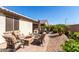 Charming backyard featuring a fire pit and comfortable seating at 22607 W Antelope Trl, Buckeye, AZ 85326