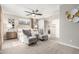 A serene bedroom featuring neutral décor, comfortable seating, and soft lighting at 22607 W Antelope Trl, Buckeye, AZ 85326