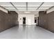 Spacious garage with epoxy floors and custom cabinets at 22607 W Antelope Trl, Buckeye, AZ 85326