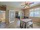 Spacious dining room with tile floors and a view into another room at 26842 N 176Th Ln, Surprise, AZ 85387