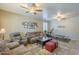 Large open living room with couches, ceiling fans, and plenty of space at 26842 N 176Th Ln, Surprise, AZ 85387