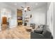 Inviting living room featuring a stone fireplace and comfortable seating at 2894 E Melody Ln, Gilbert, AZ 85234