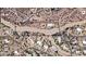 Here is an aerial view of the property's location surrounded by beautiful desert landscape and neighboring houses at 37646 N Dream St, Carefree, AZ 85377