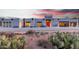 Stunning Santa Fe style home with desert landscaping and picturesque sunset views at 37646 N Dream St, Carefree, AZ 85377