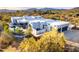 Beautiful home featuring an in-ground pool and surrounded by desert landscaping with mountain views at 37646 N Dream St, Carefree, AZ 85377