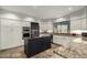 Modern kitchen with stainless steel appliances, granite countertops, and custom cabinetry at 37646 N Dream St, Carefree, AZ 85377
