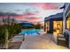 Inviting backyard pool with mountain views and a covered patio area, perfect for relaxing at 37646 N Dream St, Carefree, AZ 85377
