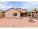 Large backyard with pergola covered patio and gravel landscaping at 38167 W Santa Clara Ave, Maricopa, AZ 85138