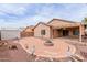 Well-kept backyard with a fire pit, shed, and decorative landscaping at 38167 W Santa Clara Ave, Maricopa, AZ 85138