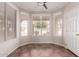 Bright dining nook with tile floor, a ceiling fan and multiple windows at 38167 W Santa Clara Ave, Maricopa, AZ 85138