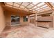 Covered patio with ceiling fan and stone accents, perfect for outdoor entertaining at 38167 W Santa Clara Ave, Maricopa, AZ 85138
