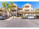 Apartment complex with covered parking and well-maintained landscaping at 3830 E Lakewood E Pkwy # 2042, Phoenix, AZ 85048