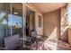 Cozy balcony offers outdoor seating and views, an ideal spot to unwind and relax at 3830 E Lakewood E Pkwy # 2042, Phoenix, AZ 85048