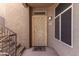 Close up exterior shot of front door with security door, and the unit number 2042 visible at 3830 E Lakewood E Pkwy # 2042, Phoenix, AZ 85048