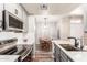 Open kitchen with modern appliances and fixtures that connects to the dining room at 3830 E Lakewood E Pkwy # 2042, Phoenix, AZ 85048