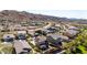 Residential area with houses nestled against the backdrop of desert landscape and mountain views at 3914 E Constance Way, Phoenix, AZ 85042