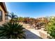Landscaped backyard featuring a patio with mature trees and a beautiful walkway at 3914 E Constance Way, Phoenix, AZ 85042