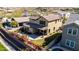 Charming backyard with a covered patio, well-maintained lawn, and a sparkling swimming pool at 3914 E Constance Way, Phoenix, AZ 85042