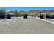Gated community entrance providing security and privacy with mountain views in the distance at 3914 E Constance Way, Phoenix, AZ 85042