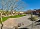 A scenic view of the community park, featuring a grassy area and recreational space for residents at 3914 E Constance Way, Phoenix, AZ 85042