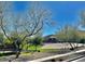 Scenic view of desert landscape and modern home, enhancing curb appeal and showcasing community charm at 3914 E Constance Way, Phoenix, AZ 85042