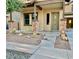 Charming single-story home featuring a covered porch and low maintenance desert landscaping at 3914 E Constance Way, Phoenix, AZ 85042
