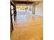 View of a spacious three car garage with epoxy flooring and built in shelving units at 3914 E Constance Way, Phoenix, AZ 85042