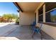 Covered patio with seating area perfect for enjoying outdoor relaxation and entertaining guests at 3914 E Constance Way, Phoenix, AZ 85042