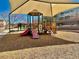 Community playground featuring colorful play structures, providing a fun and engaging space for  at 3914 E Constance Way, Phoenix, AZ 85042