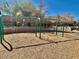 Outdoor swings in the community, inviting residents to enjoy leisure time and socialize in a serene environment at 3914 E Constance Way, Phoenix, AZ 85042