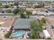 Aerial view showcasing the backyard pool, patio, and green space at 3931 W Augusta Ave, Phoenix, AZ 85051