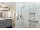 Newly renovated bathroom featuring a glass shower and a modern vanity at 3931 W Augusta Ave, Phoenix, AZ 85051