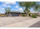 Charming single-story home with a brick driveway, spacious parking, and cozy curb appeal in daytime at 3931 W Augusta Ave, Phoenix, AZ 85051