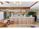 Spacious kitchen area with breakfast bar and wood cabinetry, perfect for Gathering meals at 3931 W Augusta Ave, Phoenix, AZ 85051