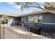 Private patio with comfortable seating, perfect for outdoor relaxation and entertaining with brick accent wall at 3931 W Augusta Ave, Phoenix, AZ 85051