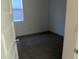 Neutral bedroom features carpet and a window providing soft, natural lighting at 4330 N 94Th Ave, Phoenix, AZ 85037