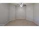 This is a bedroom that features neutral paint and carpet, providing a blank slate at 45071 W Yucca Ln, Maricopa, AZ 85139