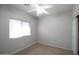 Bedroom featuring a closet and a window at 45071 W Yucca Ln, Maricopa, AZ 85139