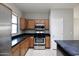 Well-equipped kitchen features stainless steel appliances and ample counter space at 45071 W Yucca Ln, Maricopa, AZ 85139