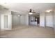 The spacious living area provides access to the kitchen and additional rooms at 45071 W Yucca Ln, Maricopa, AZ 85139