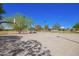 Open basketball court featuring lush tree landscape at 4552 E County Down Dr, Chandler, AZ 85249
