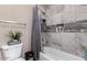 Charming bathroom featuring stone tile, a new shower head, and modern updates at 4552 E County Down Dr, Chandler, AZ 85249
