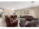 Spacious living room with neutral walls, tile floors, and stylish furniture, perfect for relaxing or entertaining at 4552 E County Down Dr, Chandler, AZ 85249