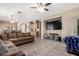 Spacious living area with an entertainment center, a comfortable sofa, and an open layout for seamless living at 4552 E County Down Dr, Chandler, AZ 85249
