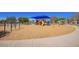 Playground featuring colorful play structures with a picnic shelter for shade at 4552 E County Down Dr, Chandler, AZ 85249