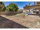 Spacious backyard with a sparkling pool, storage shed, and covered patio for outdoor living at 4940 E Grandview St, Mesa, AZ 85205