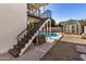 Step into the backyard with a refreshing pool and convenient access to the second-story staircase at 4940 E Grandview St, Mesa, AZ 85205