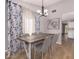 Inviting dining room showcasing a modern chandelier and backyard views at 4940 E Grandview St, Mesa, AZ 85205