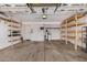 Spacious two car garage with shelving and storage at 4940 E Grandview St, Mesa, AZ 85205