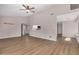 Spacious living room with wood-like flooring, neutral walls, providing a blank canvas for personalization at 4940 E Grandview St, Mesa, AZ 85205